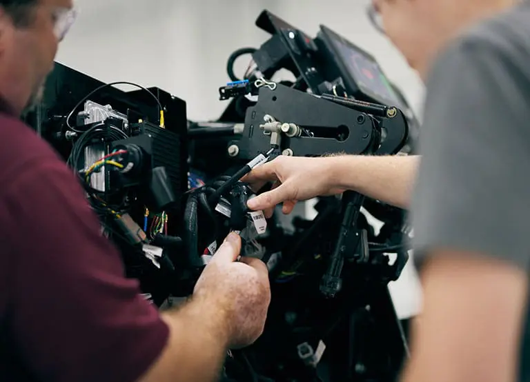 Two engineers collaborate on the design of the Workhorse W56 electric chassis