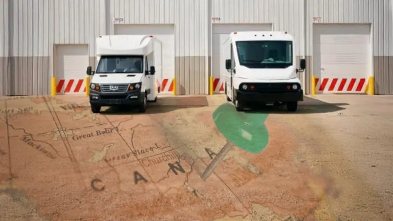 Workhorse EV step vans parked in front of a warehouse with a Canada map overlay