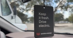 Air Freshener Hanging From Rearview Mirror With Workhorse Logo And &Quot;Keep It Fresh. Drive Electric&Quot;